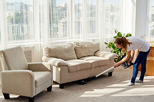 hovering under a settee
